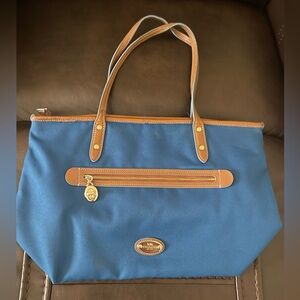 Authentic blue Coach bag with brown accents in great pre-loved condition !